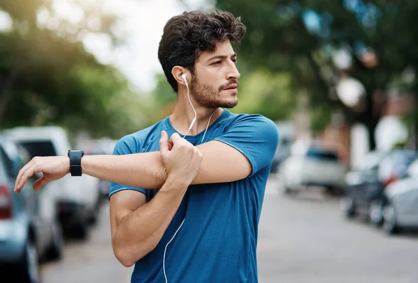 Theres Few People Out Beautiful Day Sporty Young Man Stretching — Foto de Stock