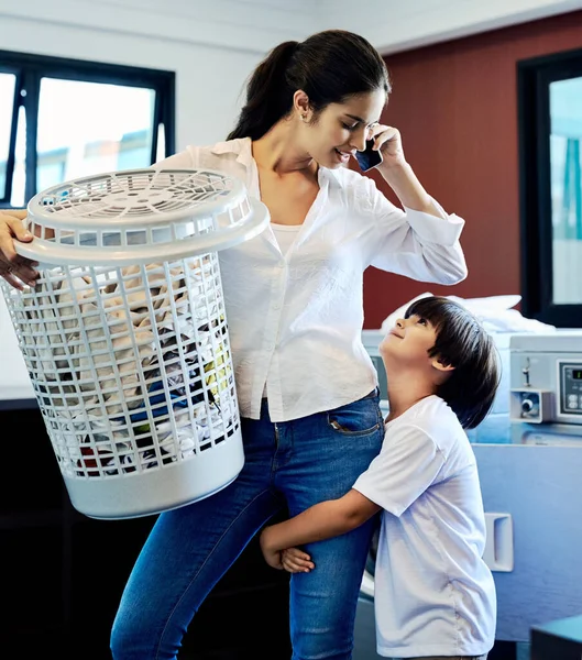 Just Wait Honey Phone Young Attractive Mother Doing Laundry Her — Foto Stock