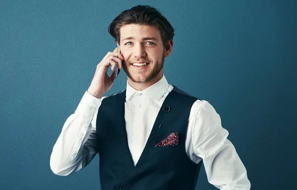 Calling Office Studio Shot Handsome Young Businessman Making Phonecall Blue — Stock Photo, Image