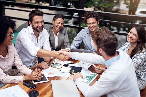 Welcome Team Two Handsome Young Businessmen Shaking Hands While Sitting — Fotografia de Stock