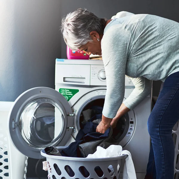 Clean Clothes Coming Right Mature Woman Doing Laundry Home — Zdjęcie stockowe