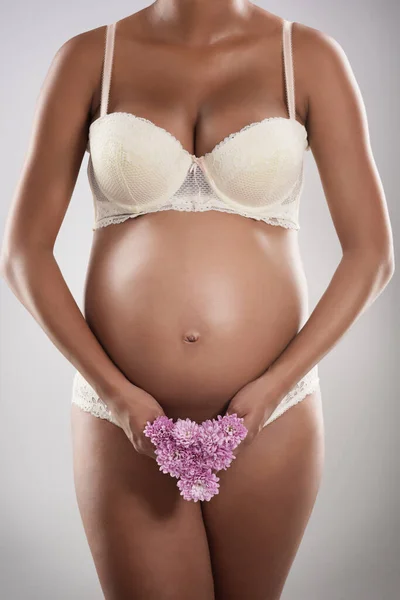 Her Pregnancy Blooming Beautifully Studio Shot Unrecognizable Pregnant Woman Holding — Foto Stock