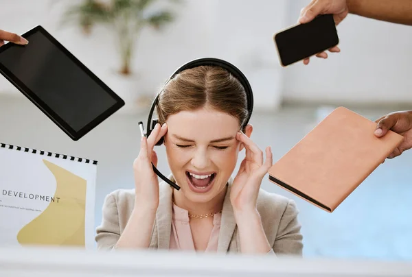 Stress, burnout and overloaded woman at work in a modern office. Female contact centre agent overwhelmed with all the work from her call center colleagues with anxiety and headache in the workplace