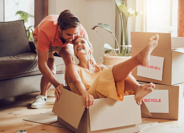 Property Buying Fun Couple Moving New House Together Being Playful — Fotografia de Stock