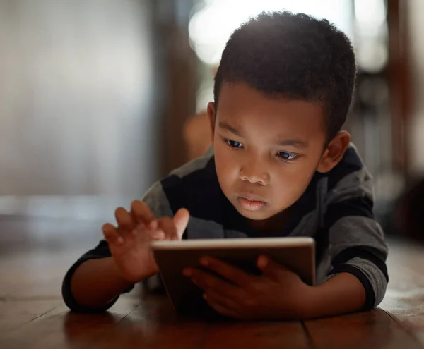 Exploring World Apps Young Boy Using His Digital Tablet While — Stock Fotó