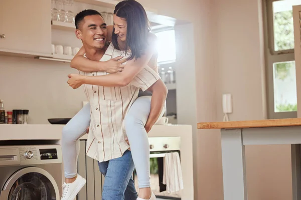 Happy Playful Excited Couple Playing Kitchen Home Boyfriend Giving Piggyback — Stockfoto