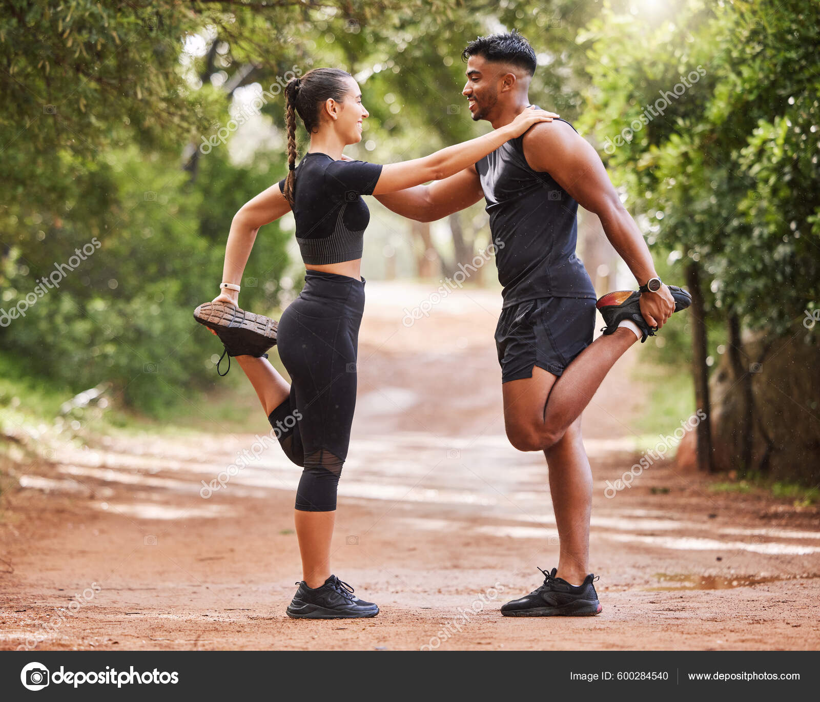 Sporty man jogging in a park stock photo