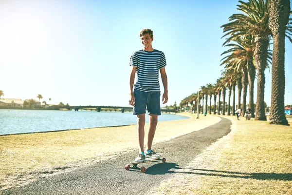 Loves Being Sun Full Length Shot Young Boy Skating Pathway — Stockfoto