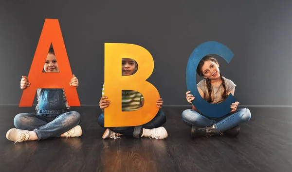 Start Basics Studio Portrait Diverse Group Kids Holding Letters Alphabet — Zdjęcie stockowe