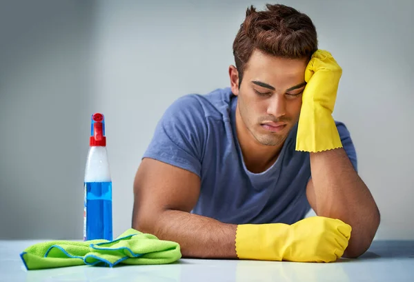 Hes Finally Done Exhausted Young Man Doing Household Chores — Stockfoto