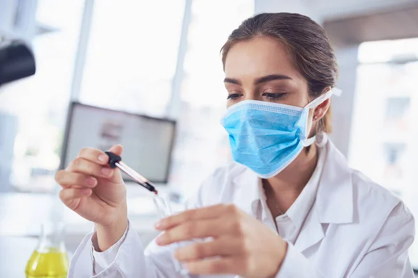 Concentration Comes Focused Young Female Scientist Wearing Surgical Mask Doing — Stock Fotó