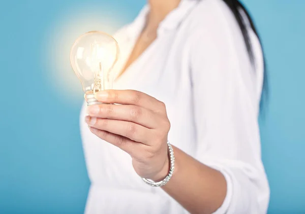 Lightbulb Moment Idea Creativity Light Hand Woman Studio Isolated Blue — Stockfoto