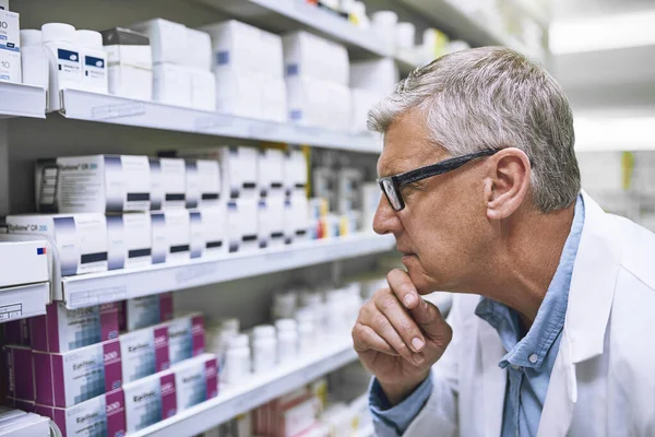 Hopefully More Sell Tomorrow Focused Mature Male Pharmacist Making Notes — Fotografia de Stock