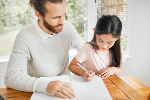 Father Helping Homeschool Kid Homework Studying Learning Math While Writing — Stok fotoğraf