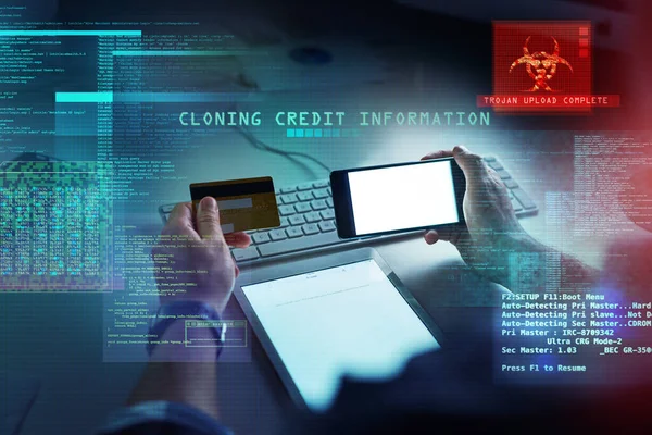 Cyber security, hacking and fraud with a computer hacker holding a credit card and phone while cloning a bank account. Theft, crime and data protection with CGI, special effects or overlay background.
