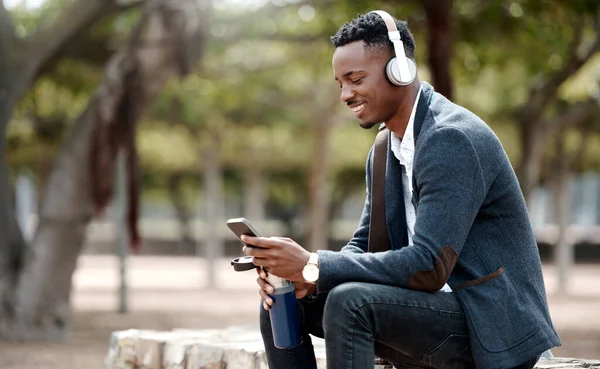 Businessman Browsing Social Media His Phone Enjoying His Music Playlist — Stock Fotó