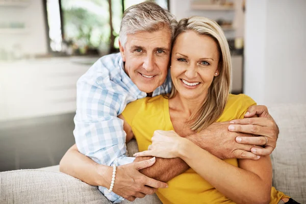 Happy Love Affectionate Senior Couple Hugging Sofa Living Room Enjoying —  Fotos de Stock