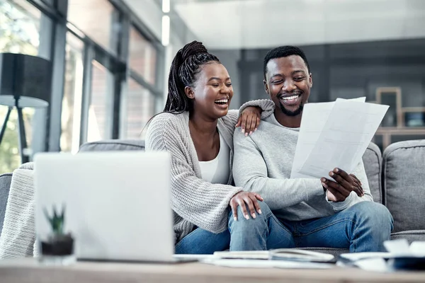 Happy Smiling Carefree Black Couple Checking Finances Laptop Home Cheerful — Stockfoto
