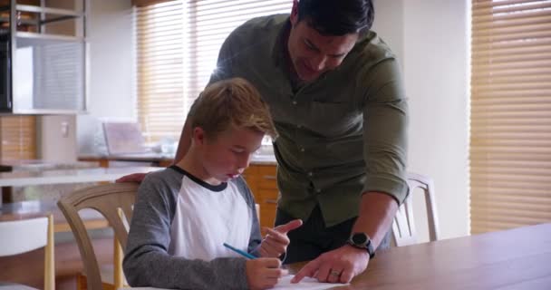 Father Helping Son Homeschool Homework School Work Education Test While — Stockvideo