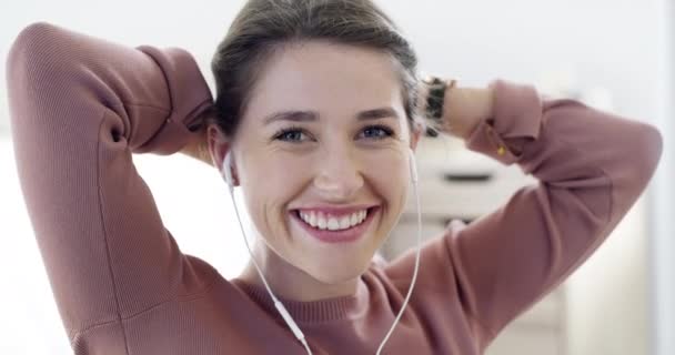 Cheerful Happy Smiling While Listening Music Earphones While Tying Her — Stockvideo