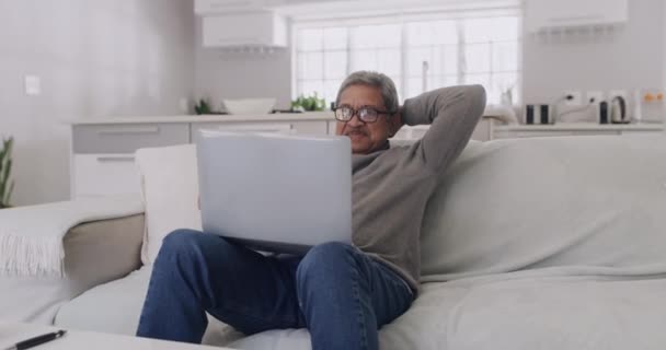 Happy Smiling Elderly Man Enjoying Entertainment Laptop While Relaxing Sofa — Stockvideo