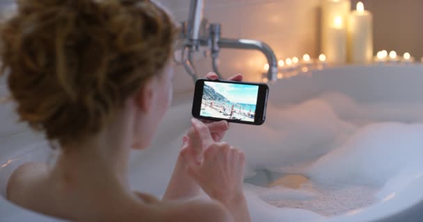 Woman Relaxing Her Bubble Bathtub Looking Holiday Vacation Getaway Photos — Vídeo de stock