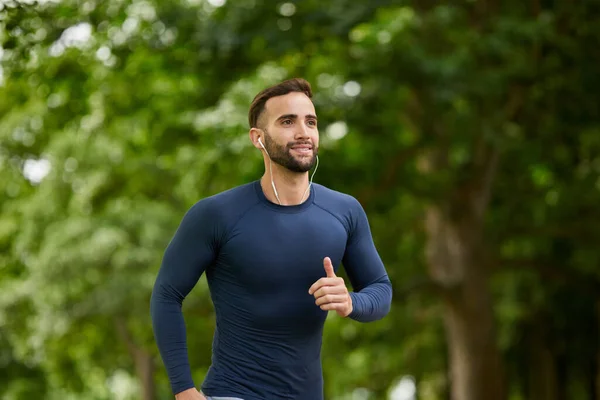 Leaves All Out Track Handsome Young Male Runner Listening Music — Stockfoto