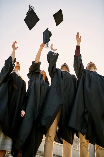 Its Big Day Celebration Group Students Throwing Hats Air Graduation — Zdjęcie stockowe