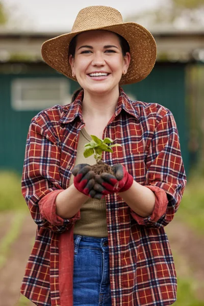 Sustainable Farmer Holding Plant Seedling Outdoors Smiling Happy Her Organic — Stockfoto