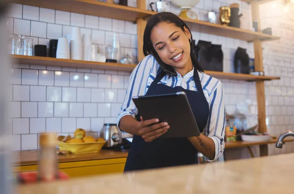 Restaurant worker on tablet, phone call and making food payment, delivery or crm conversation with a customer. Business owner or manager of fast food store, coffee shop or cafe shopping for supplies.