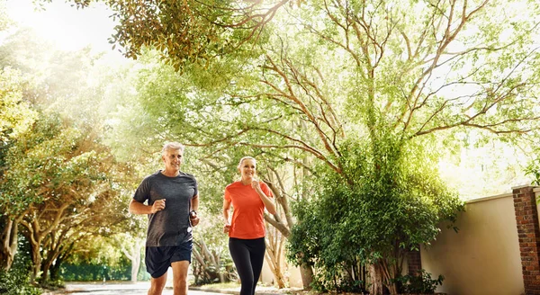 Staying Fit Easy Stepping Mature Couple Out Jogging Sunny Day — Foto de Stock