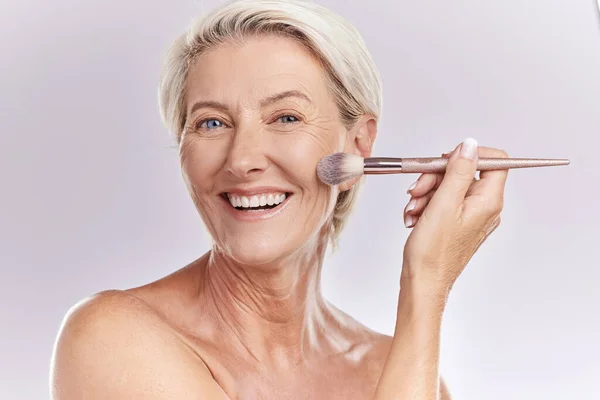 Beauty Makeup Cosmetics Senior Woman Make Brush Applying Foundation Concealer — Stock Fotó