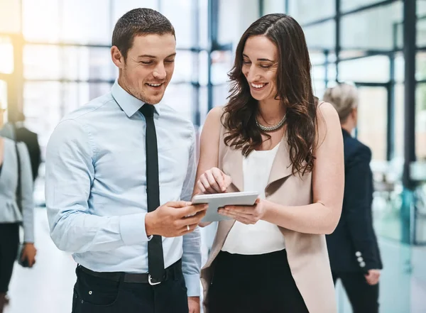 Two Heads Better One Two Young Businesspeople Working Digital Tablet — Stockfoto