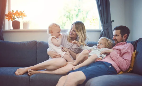 Family Goals Adorable Young Family Four Relaxing Together Sofa Home — Stock fotografie