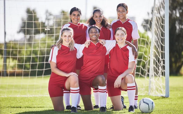 Female football team smiling, happy and excited portrait before training, match or workout session. Fitness, fit and active soccer people standing together, teamwork and unity for the game outdoors