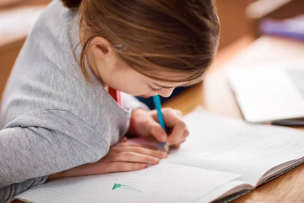 Filling Her Workbook Much Knowledge Elementary School Girl Writing Her — Stok fotoğraf