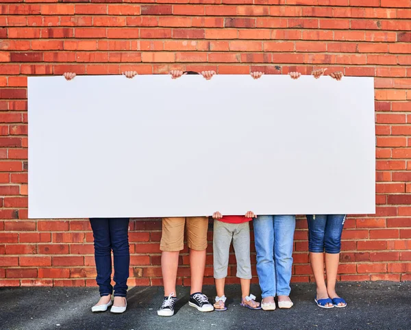 Weve Saved Space You Group Young Children Holding Blank Sign — Stockfoto