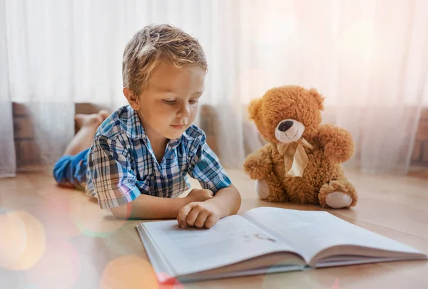 Bear Loves Read Him Little Boy Lying Floor Book His — Foto de Stock