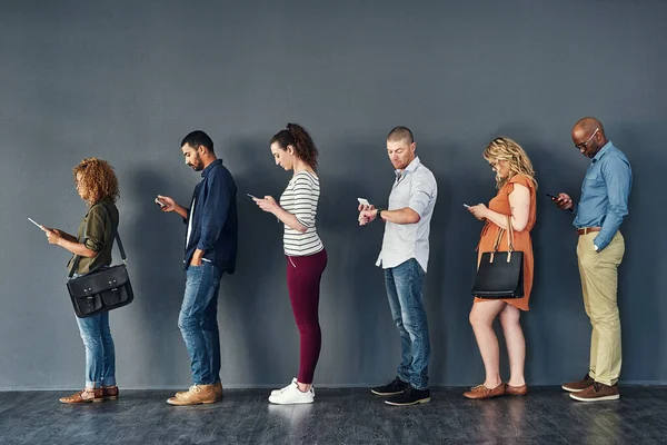 Connected Own Ways Studio Shot People Waiting Line Grey Background — Stockfoto