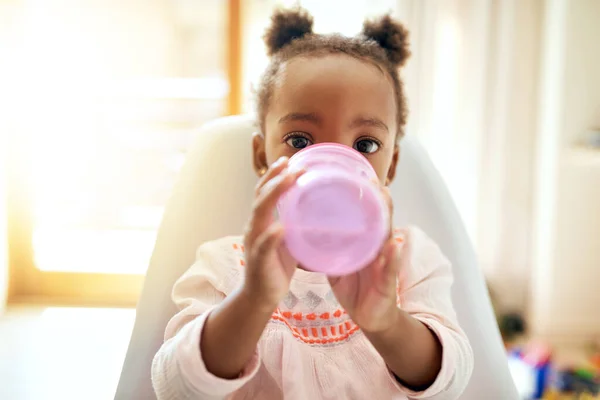 Thirsty Cropped Portrait Adorable Little Girl Drinking Bottle Home — Foto de Stock