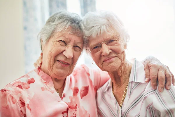 Shes Golden Girl Portrait Two Happy Elderly Women Embracing Each — Fotografia de Stock