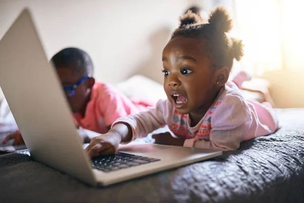 Shes Bundle Excitement Adorable Little Girl Playing Laptop Next Her — Stock Photo, Image
