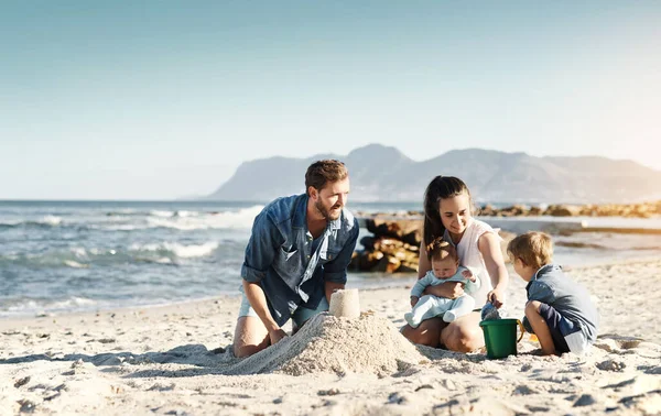 Little Moments Theyll Cherish Forever Happy Family Building Sandcastles Together — Stockfoto