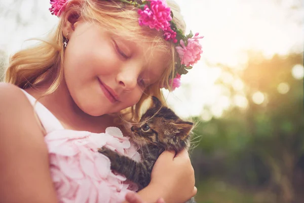 Furry Friend Happy Little Girl Holding Kitten Smiling While Sitting — Photo
