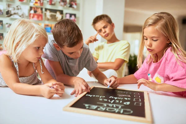 Doing Chores Teaches Kids Take Responsibility Kids Writing List Chores — Stock Photo, Image