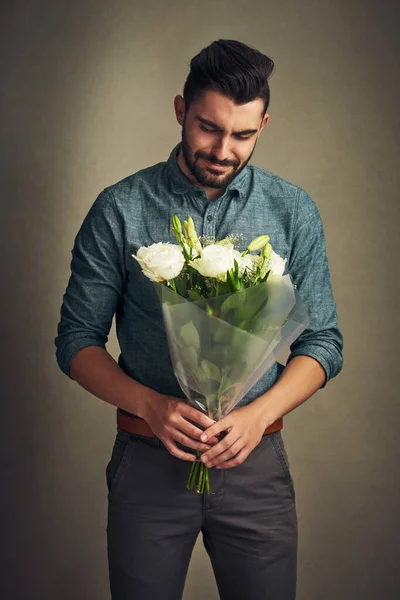 Hes Sweet Well Roses Studio Shot Handsome Young Man Holding — Zdjęcie stockowe