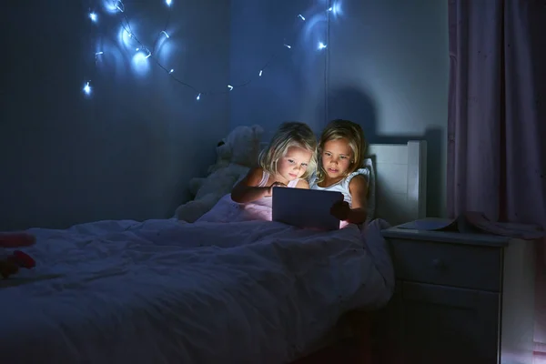 Taking Turns Playing Favourite Games Online Two Little Girls Using — Zdjęcie stockowe