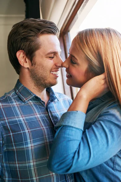 Kiss Affectionate Young Couple Standing Window Home — 图库照片