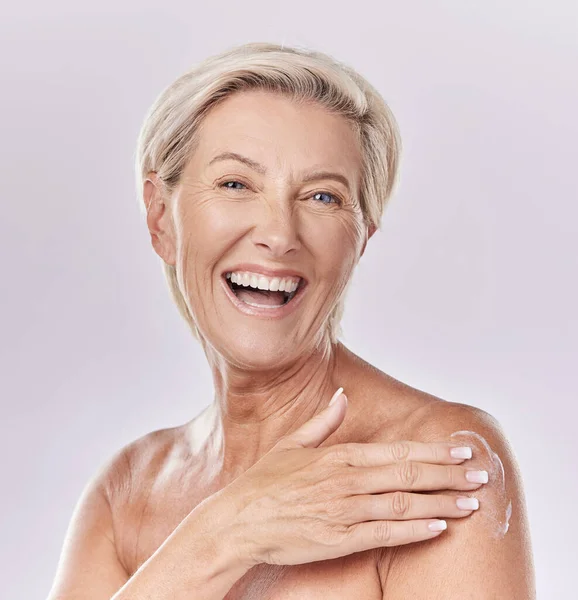 Sunscreen, skincare and body care of senior woman applying cream to skin with a studio portrait. Skin care, clean and hygiene model with anti aging wrinkles or moisturizing product for aging wellness.
