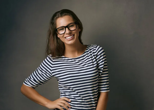 What matters most is how you see yourself. Studio shot of an attractive young woman wearing glasses
